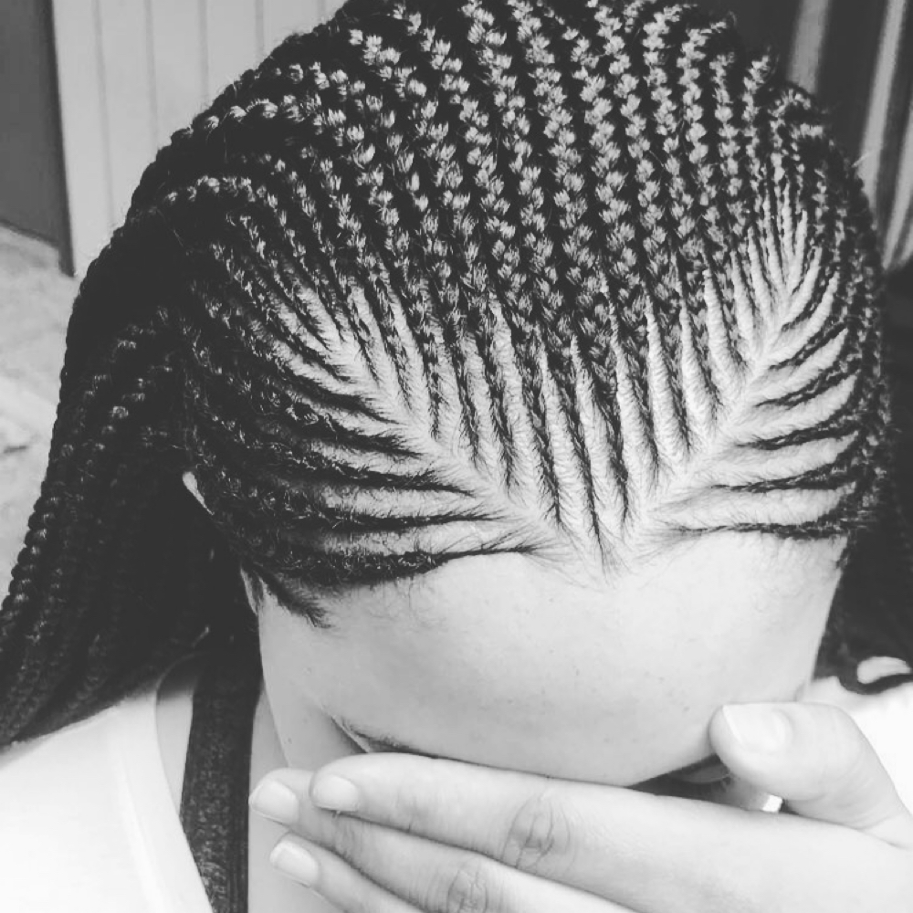 Retouch Tribal Braids Lowerback at Zara Hair Braiding Salon in 30328