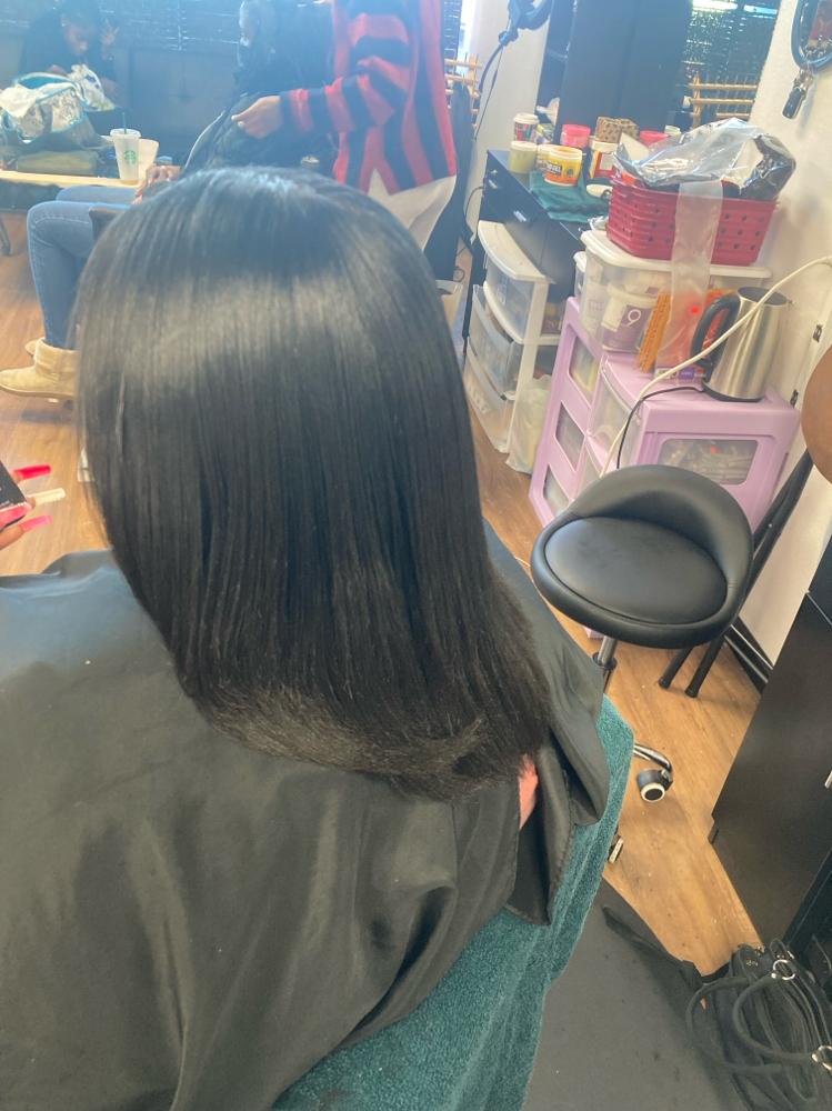 Relaxer + style at Kharyzma Beauty in Sacramento, CA