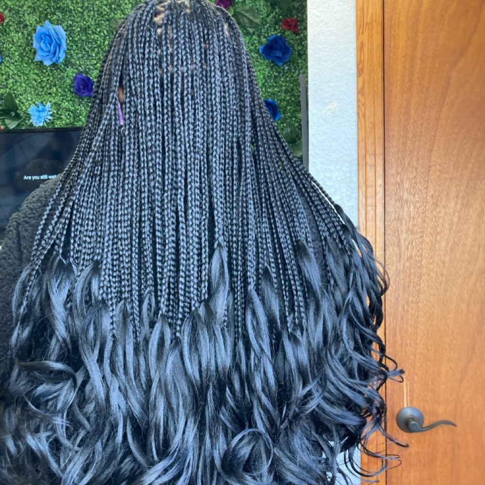 small French curl knotless braids at TheBraider Hair Academy in Duncanville, TX