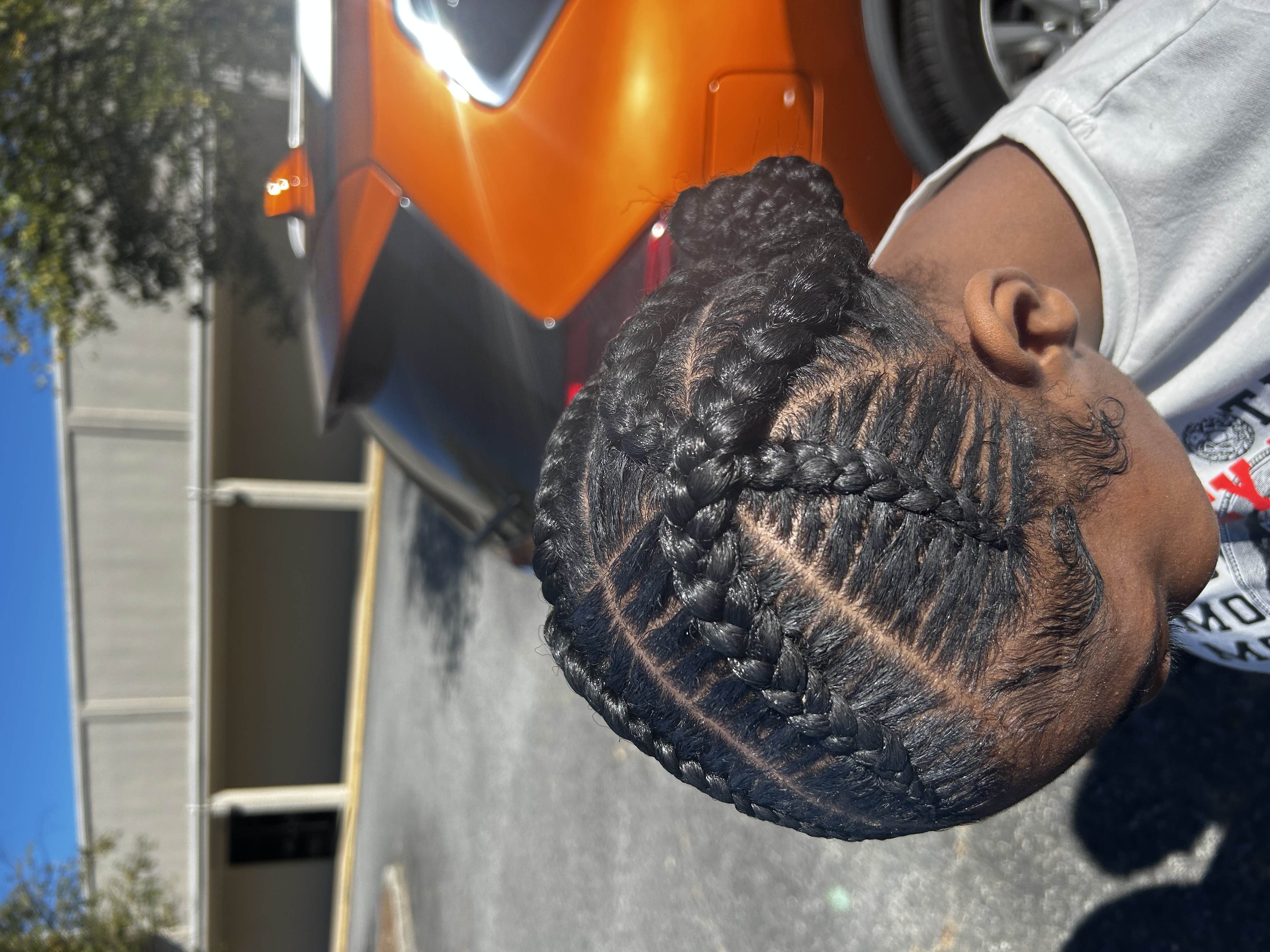 Feed-in Criss Cross Braids at Braided,LLC in Lacrosse, VA