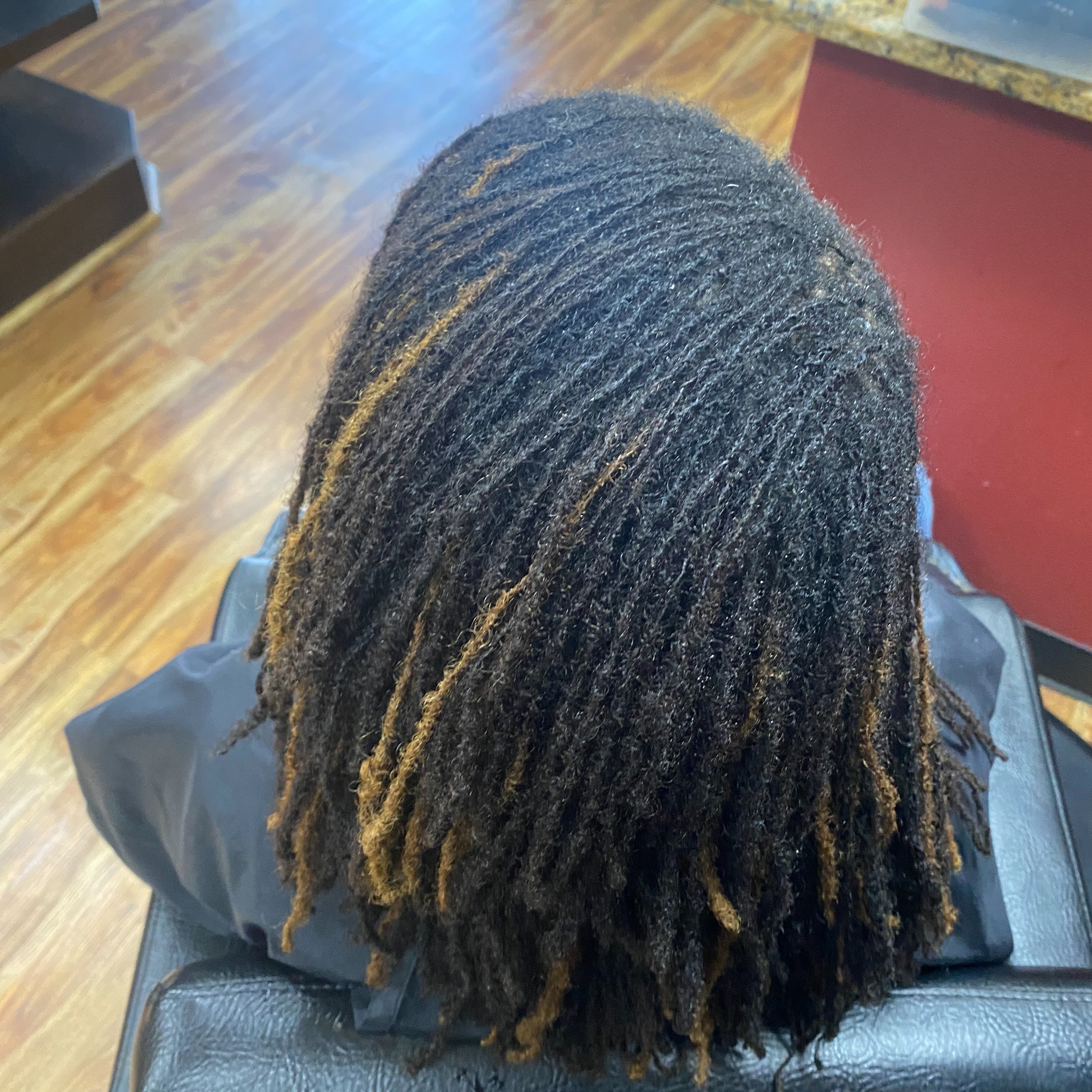 Sisterlocks Repair Re-Tightening at Designer Glitz & Glamour Salon and Med Spa in Universal City, TX