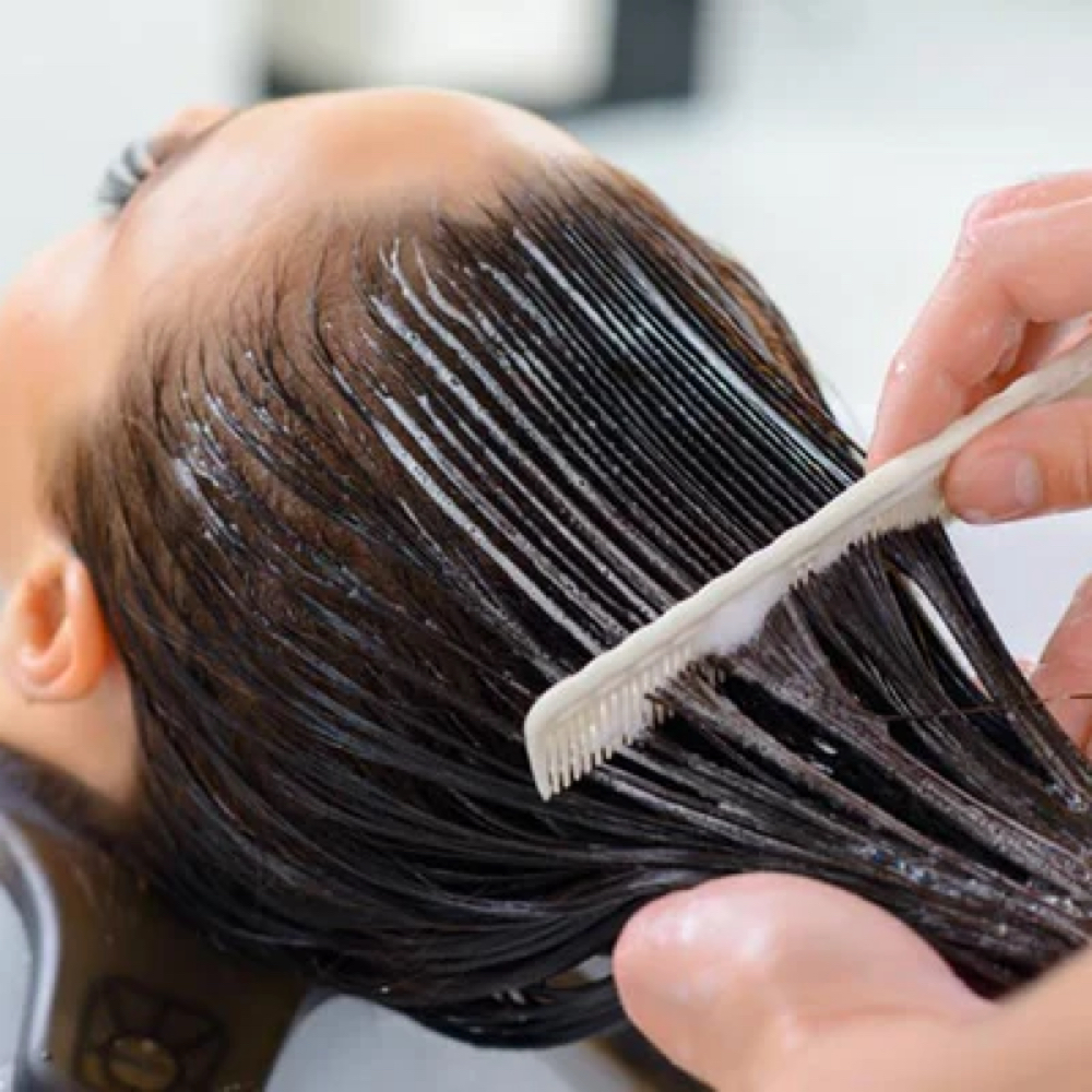 Deep Conditioning with Blowout at Deep Breath Salon & Holistic Center in Western Cranston, RI