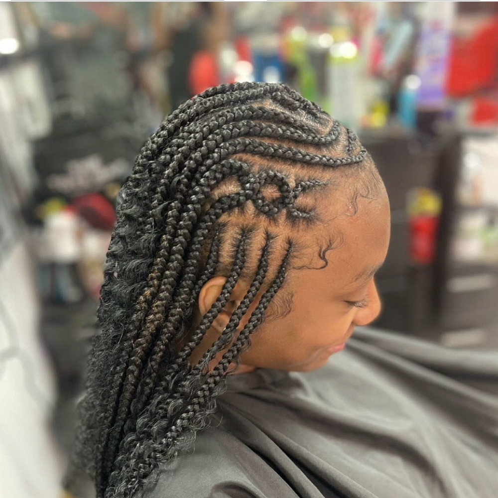 Half Cornrow / Box Braids at Madame Jay Salon in Freeport, NY