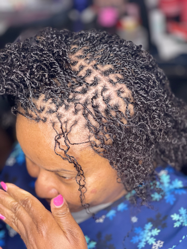 Retightening Microlocs at Royalty Braids And Weave LLC in Melbourne, FL