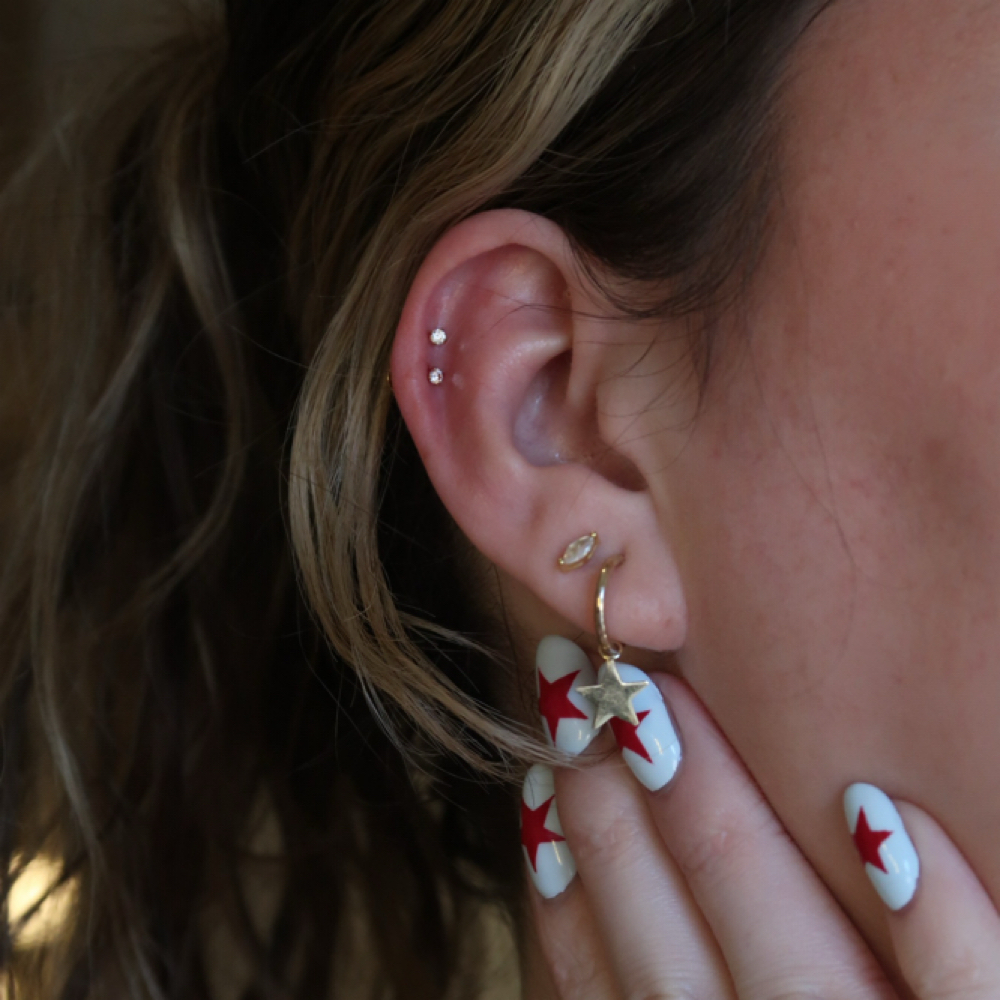 Double Helix Piercing at DAZEY AESTHETIC COLLECTIVE in Phoenix, AZ