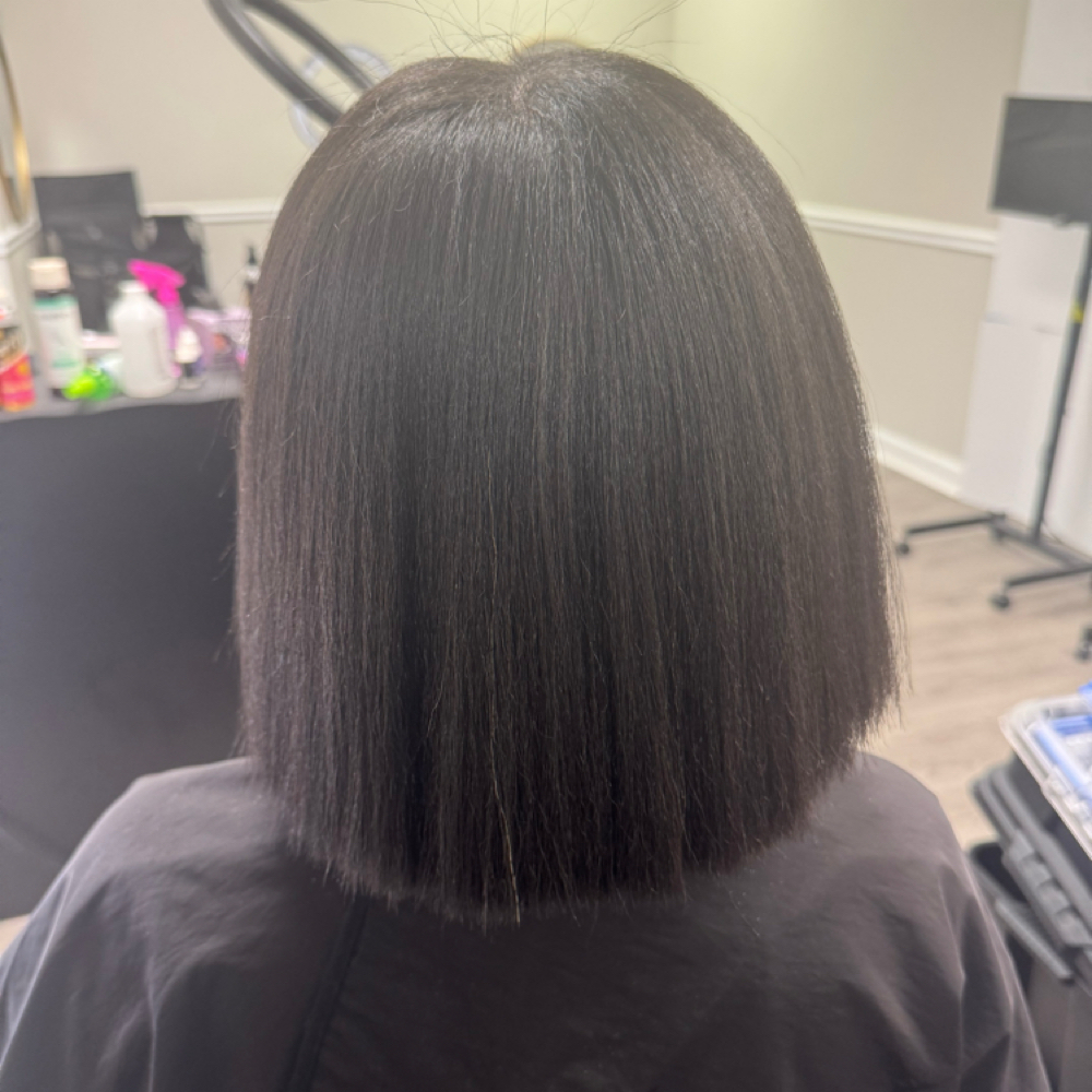 Silk Press level 2 at Glamour Beauty Body & Wellness in Mobile, AL