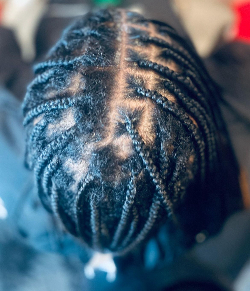 Touch Up-Exclusive Butt Length at K.M.H.&S. Braiding in Chicago, IL