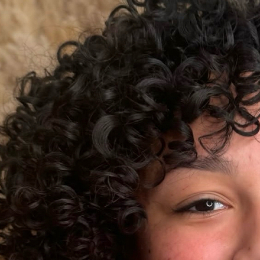 Bang trim at Curl Haven in Woodbridge, NJ