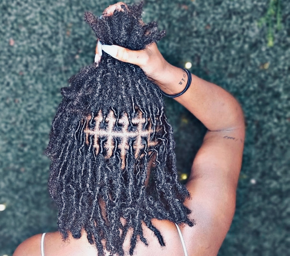 Wash And Retwist (mid-back-waist) at The Mane Aura in Columbia, SC