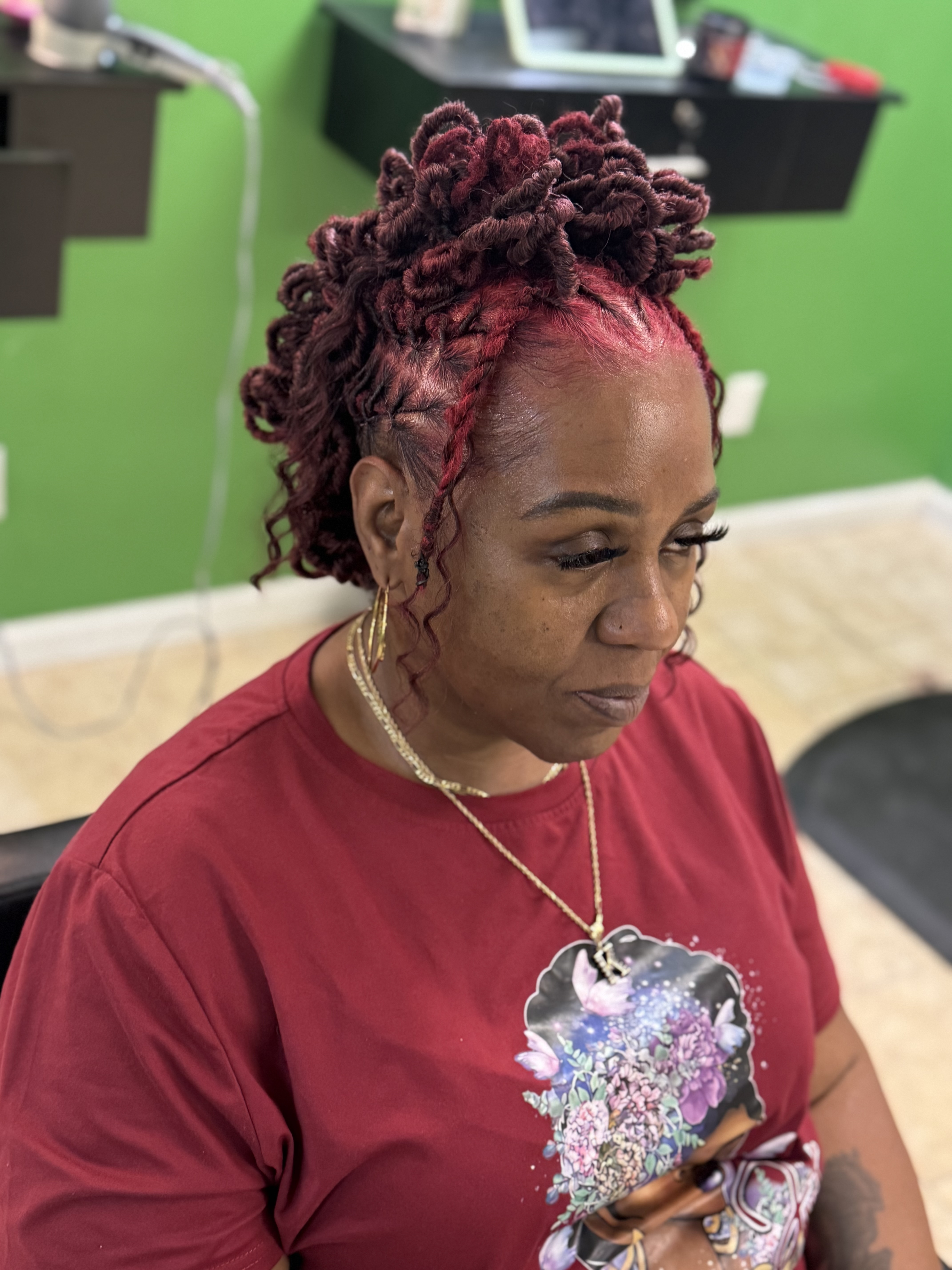 Loc Petal Bun Mohawk at Josiey Styles in Bossier, LA