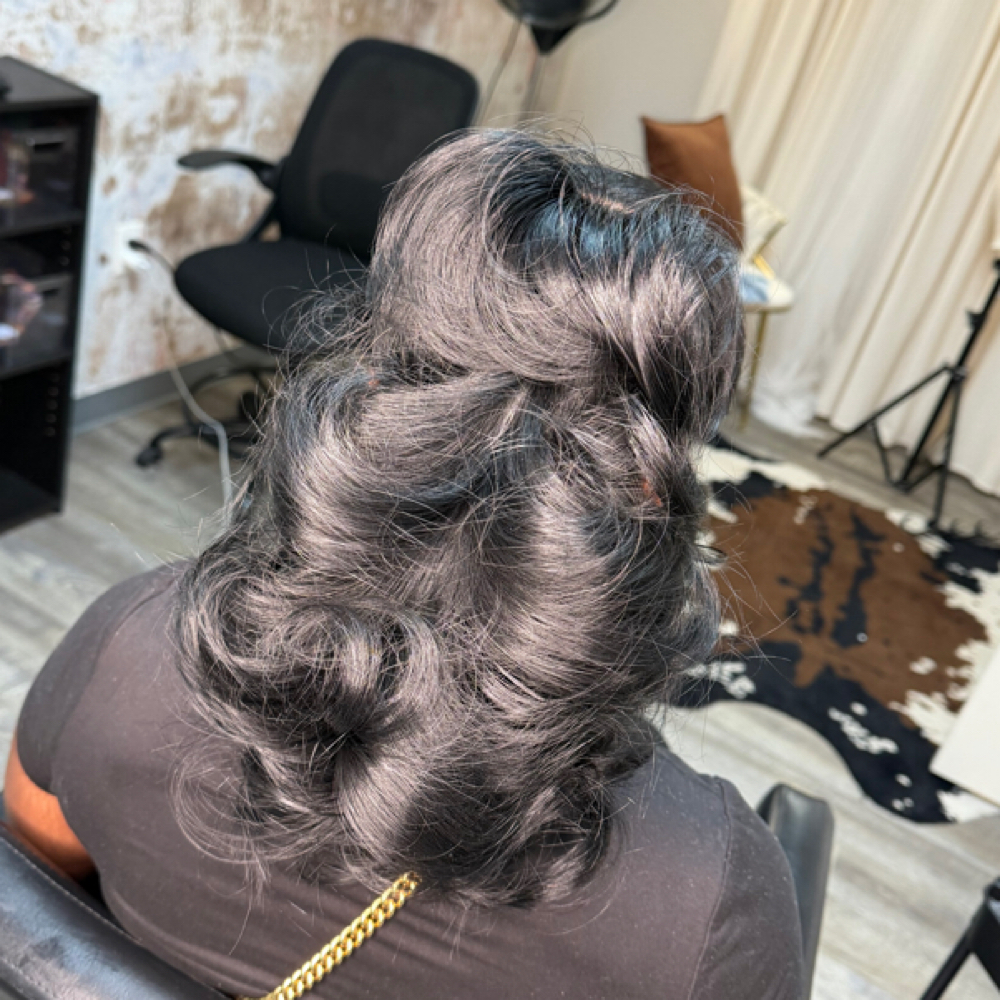 Feathered Sleek Ponytail at Faith TheBraider in Milwaukee, WI