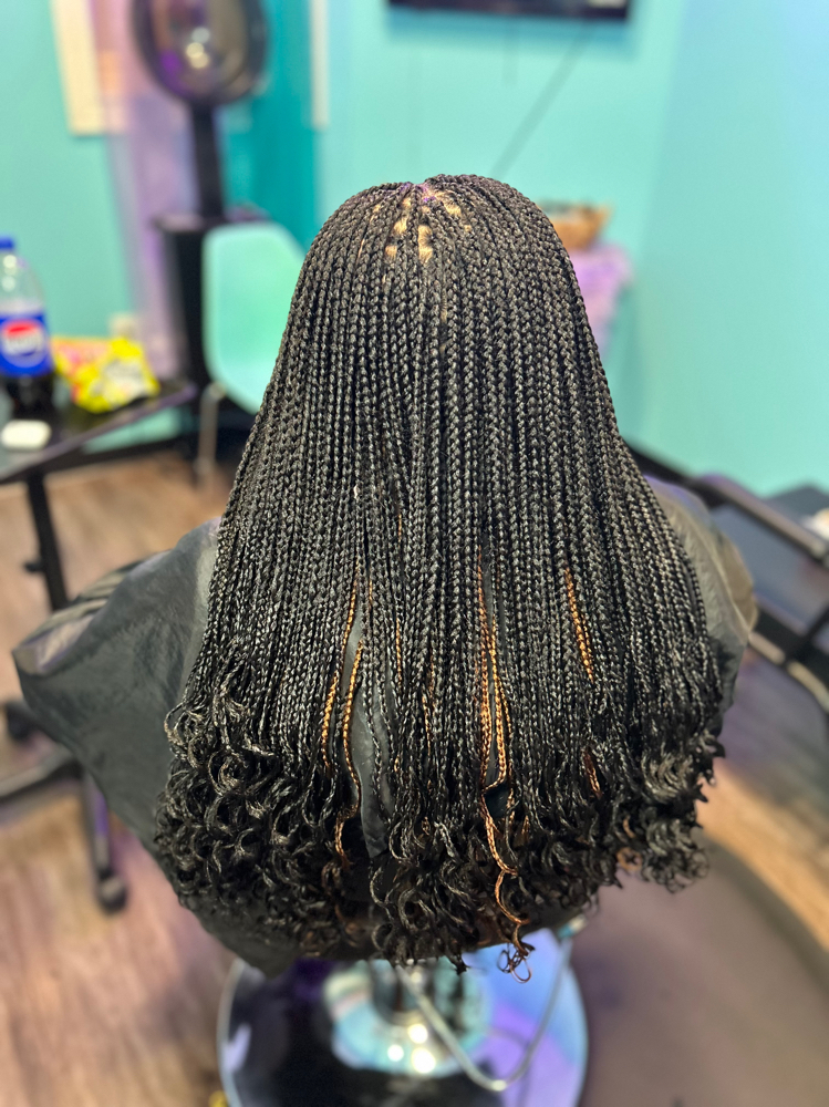 Small Knotless Braids at Thahairtherapist in Houston, TX