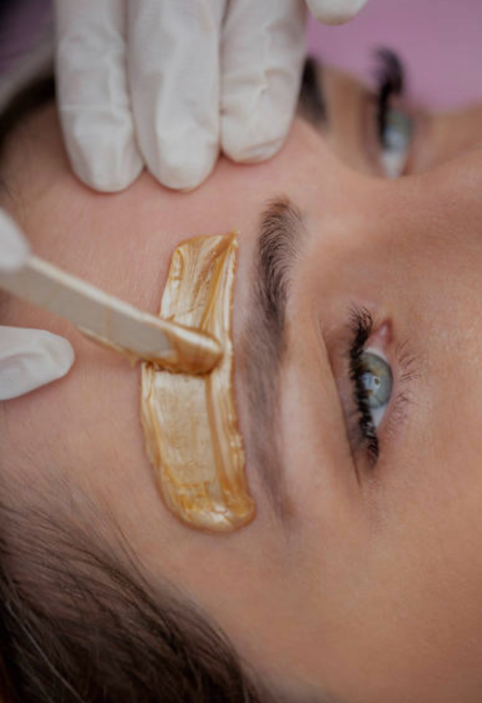 Brow Wax + 1 Facial Wax