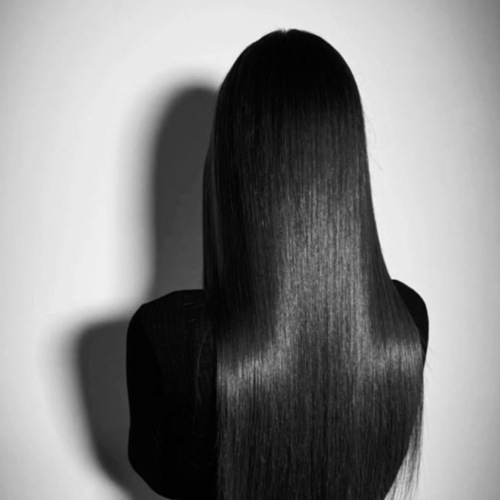 Silk press hair styling at Salon Ambiance in Fall River, MA