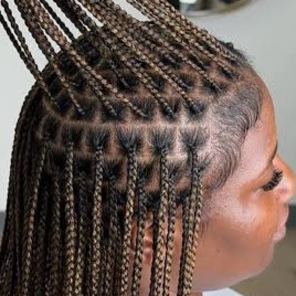 Small Miracle Knots (Feed-in) at Kinky Curly Beauty's Hair Studio in Douglasville, GA