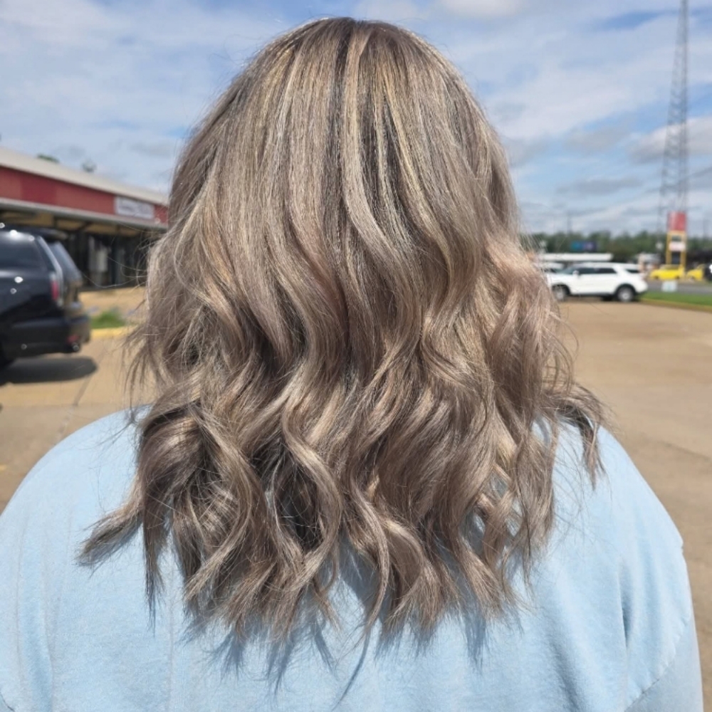Curling at Get Cut & Dye Hair Salon & Spa in Alexandria, LA
