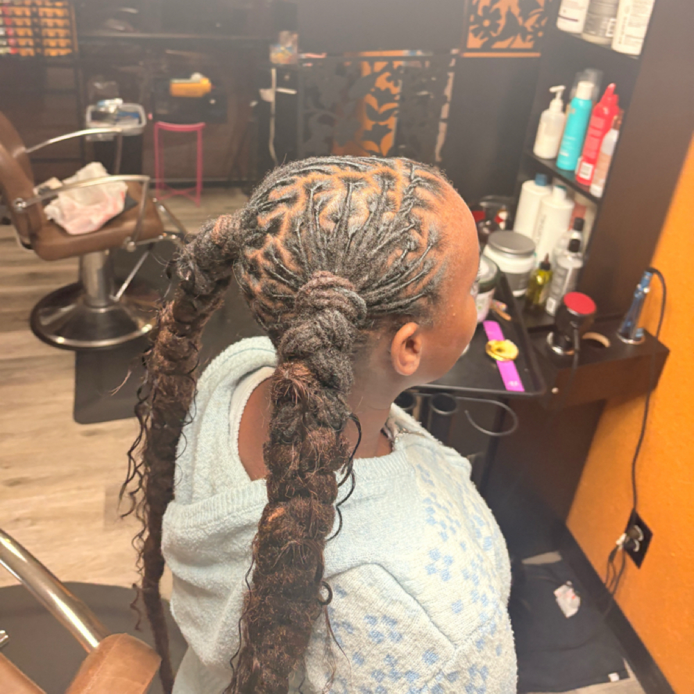 2 Single Braided Ponytails at Loccd by Tee in Arlington, TX
