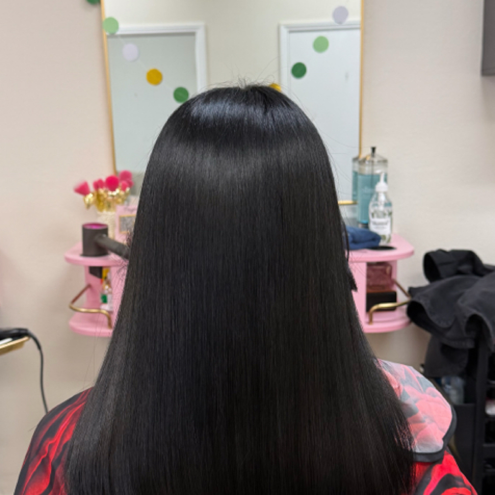 Flat iron hair straightening servic at Xiomara Ramirez Beauty in Chula Vista, CA