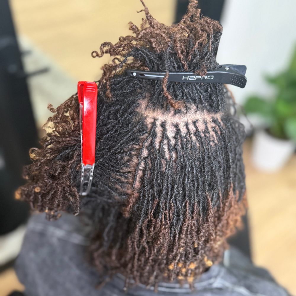 Sisterlocks Retightening at Royal Roots Loc Experience in Chester, VA