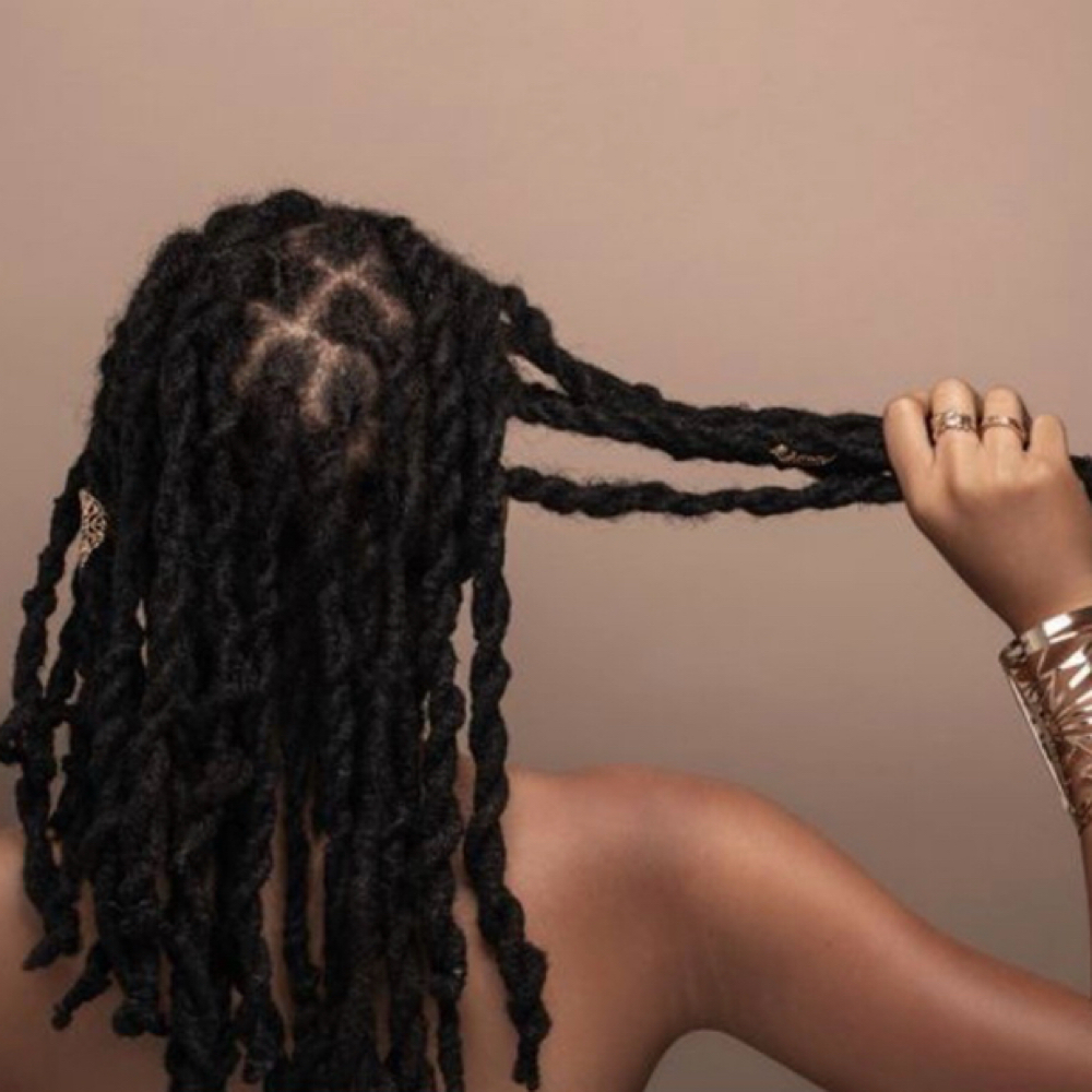 Interlocking -100 Locs Or Less at Prestige Salon in Kansas City, MO