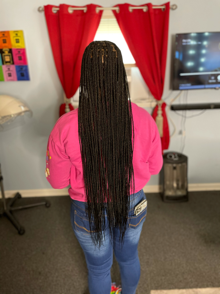Small Butt length Knotless Braids at Crowned Hair in Augusta, GA
