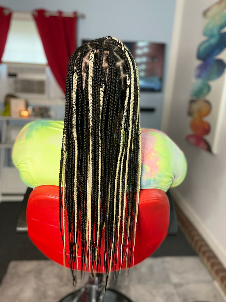 Medium waist length Knotless Braids at Crowned Hair in Augusta, GA