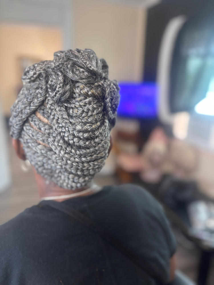 Braided Style with weave included at The Braid Boutique 706 in Augusta Ga, GA