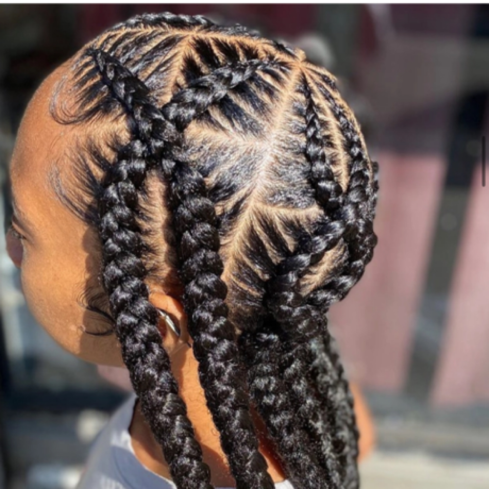 Criss-cross stitch braids at Luxury By Fatima in Atlanta, GA