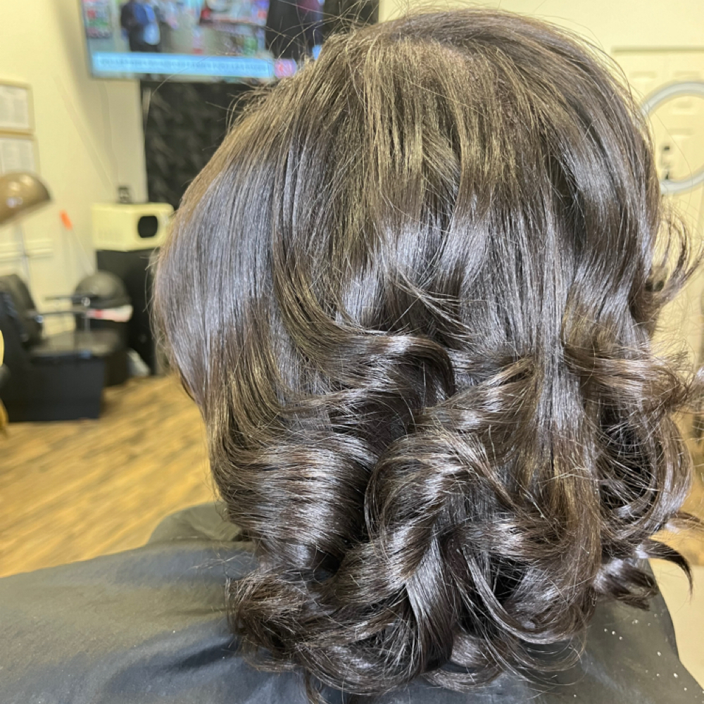 Silk Press at Glamour Girls Hair Studio in Garfield Heights, OH