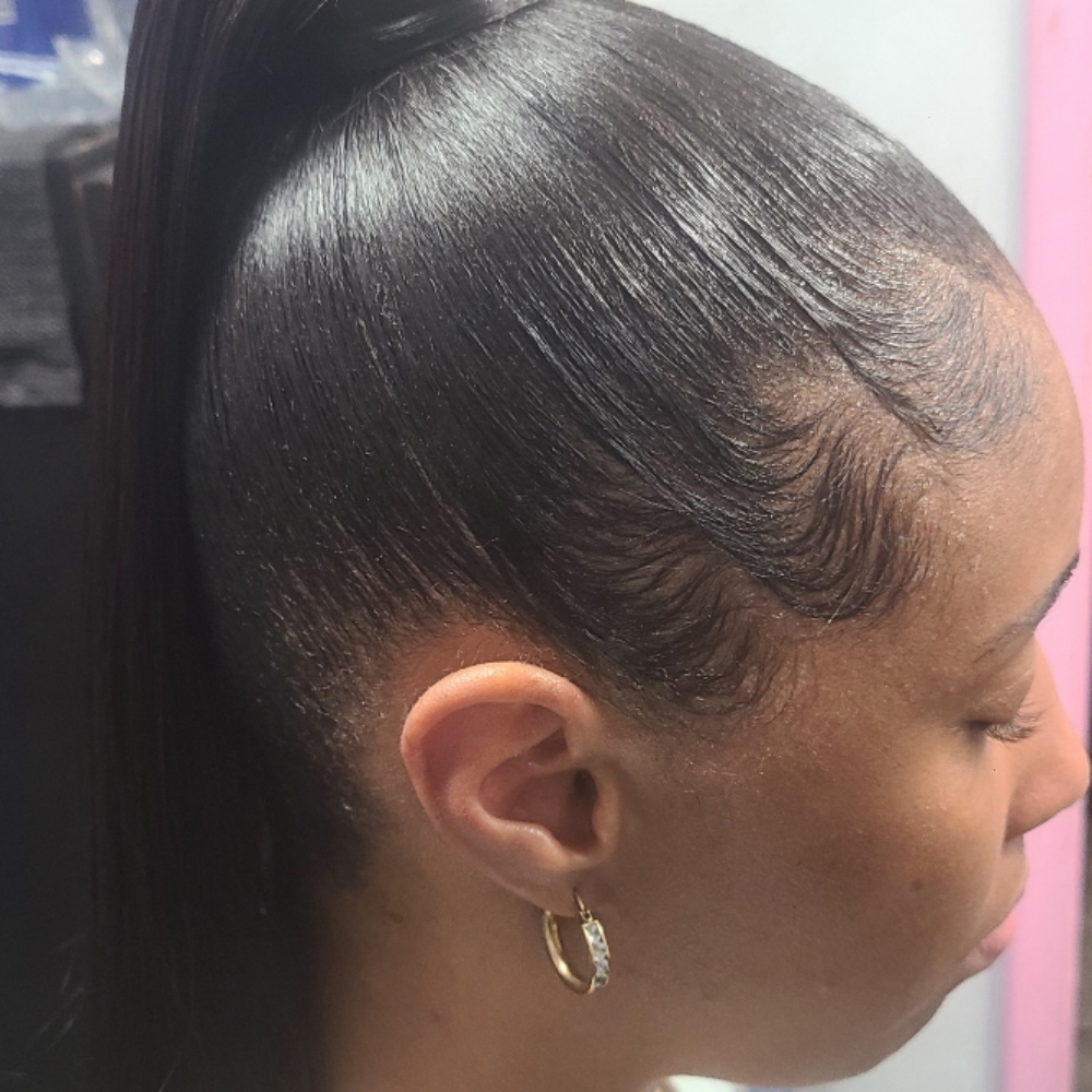 Ponytail Or Buns at Chon's Unique House of Hair in Detroit, MI