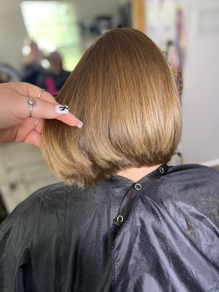 Women’s haircut only at Pretty Parlor By Lyric in Humble, TX