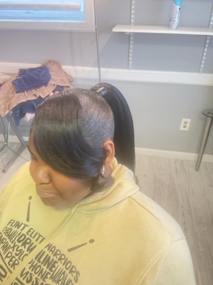 Barbie pony w curled bang at The Hairapist Experience in Mount morris, MI