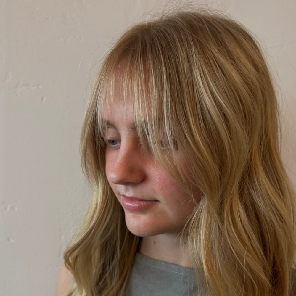 Bang Trim at Mālama Hair Lounge in Rocklin, CA