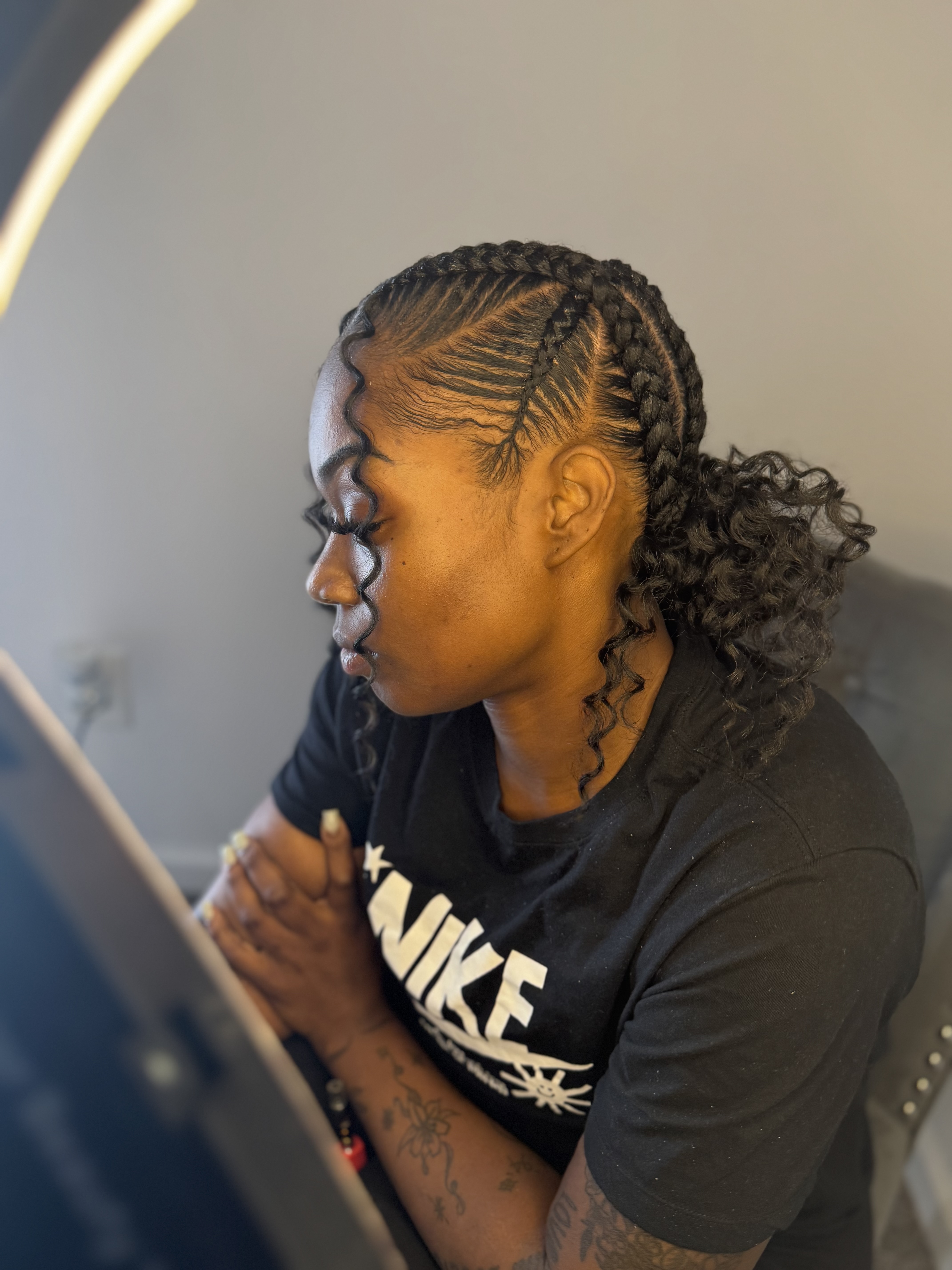 4 Stitch Braid Curly Buns at The TreJa Touch in Indianapolis, IN