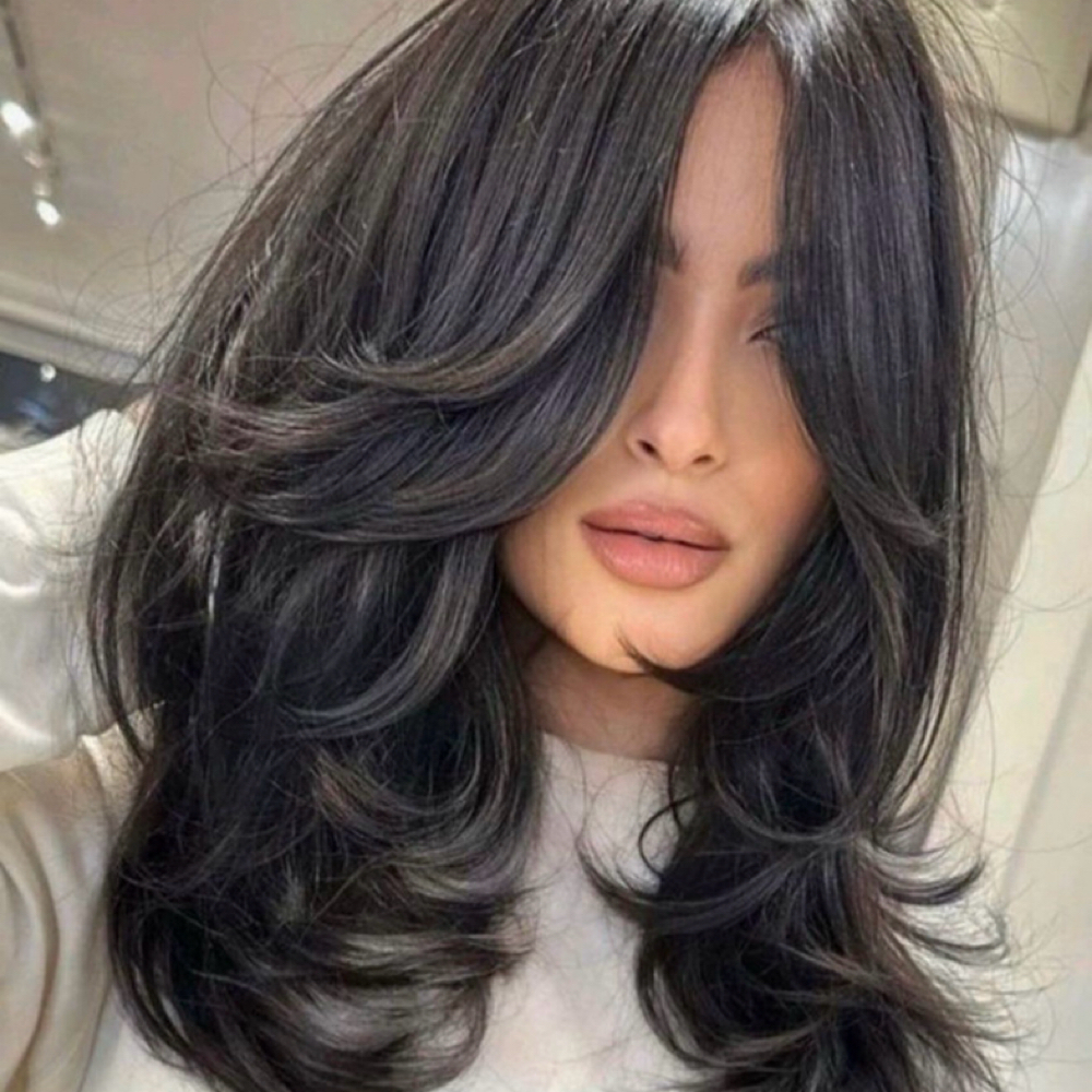 Woman  Cut And Blowout at Edith’s Hair Studio in Michigan, MI