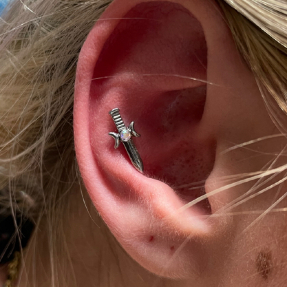 Conch at Calico Creek Tattoo Co. in Wichita, KS