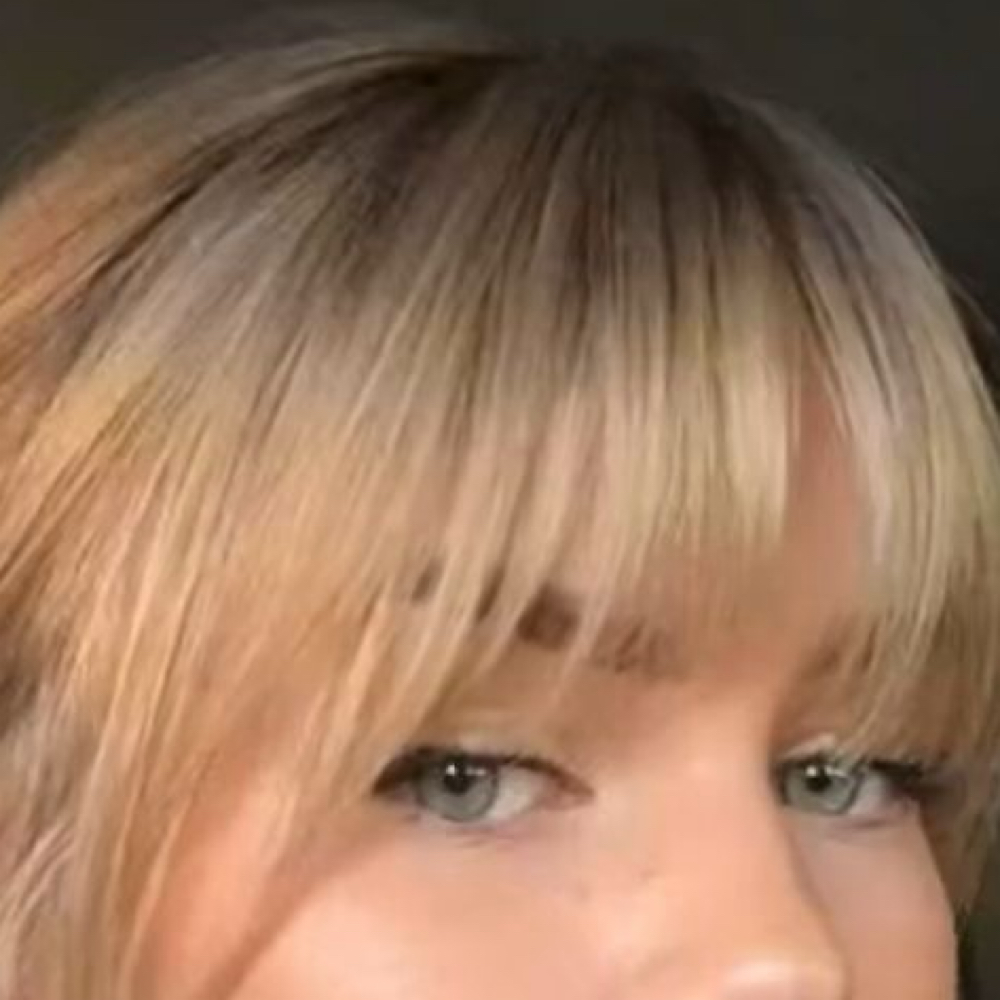 Bang trim at Beauty Empire Salon in Raymore, MO