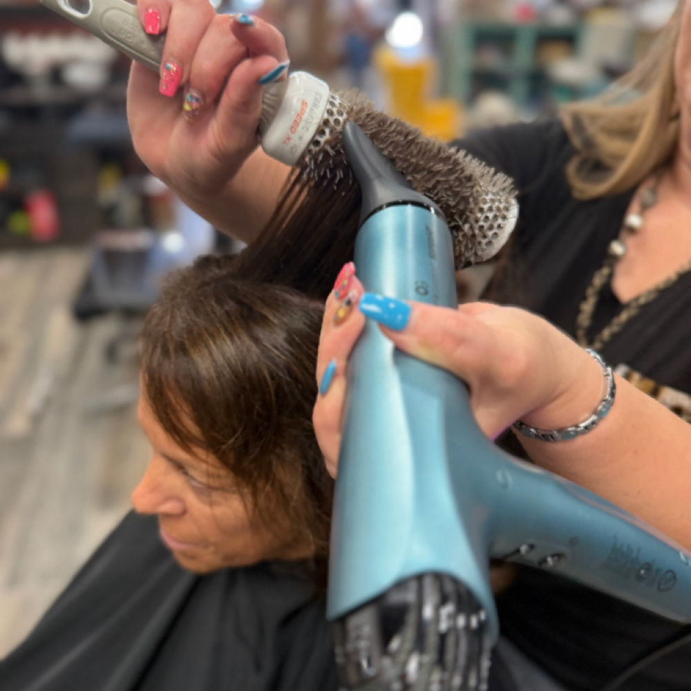 Shampoo & Blow-dry at Desert Rose Beauty Co in Friendswood, TX