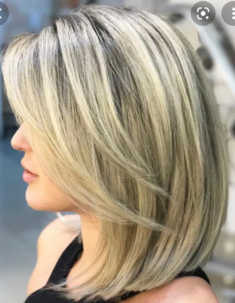 Women’s Haircut w/ shampoo & finish