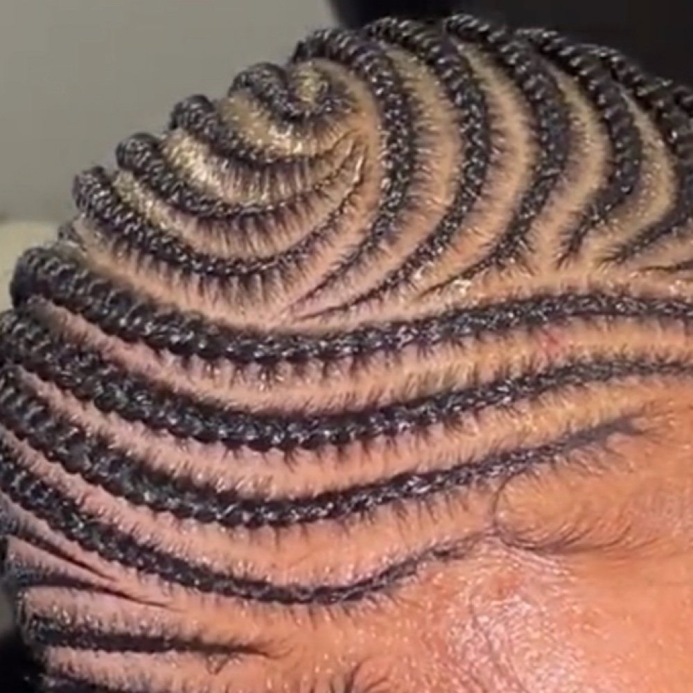 Small Cornrow Design W/Hair Added at Dose Braids in Dallas, TX