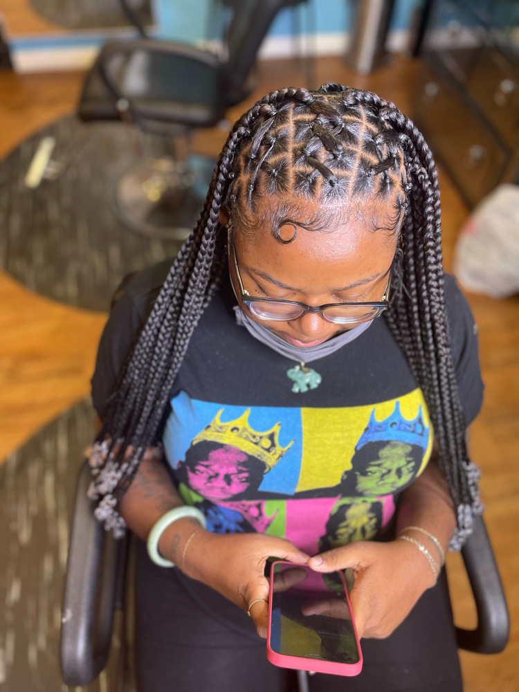 RUBBER BAND TRIBAL SmediumKNOTLESS at Drea’s hair design in Oakland, CA