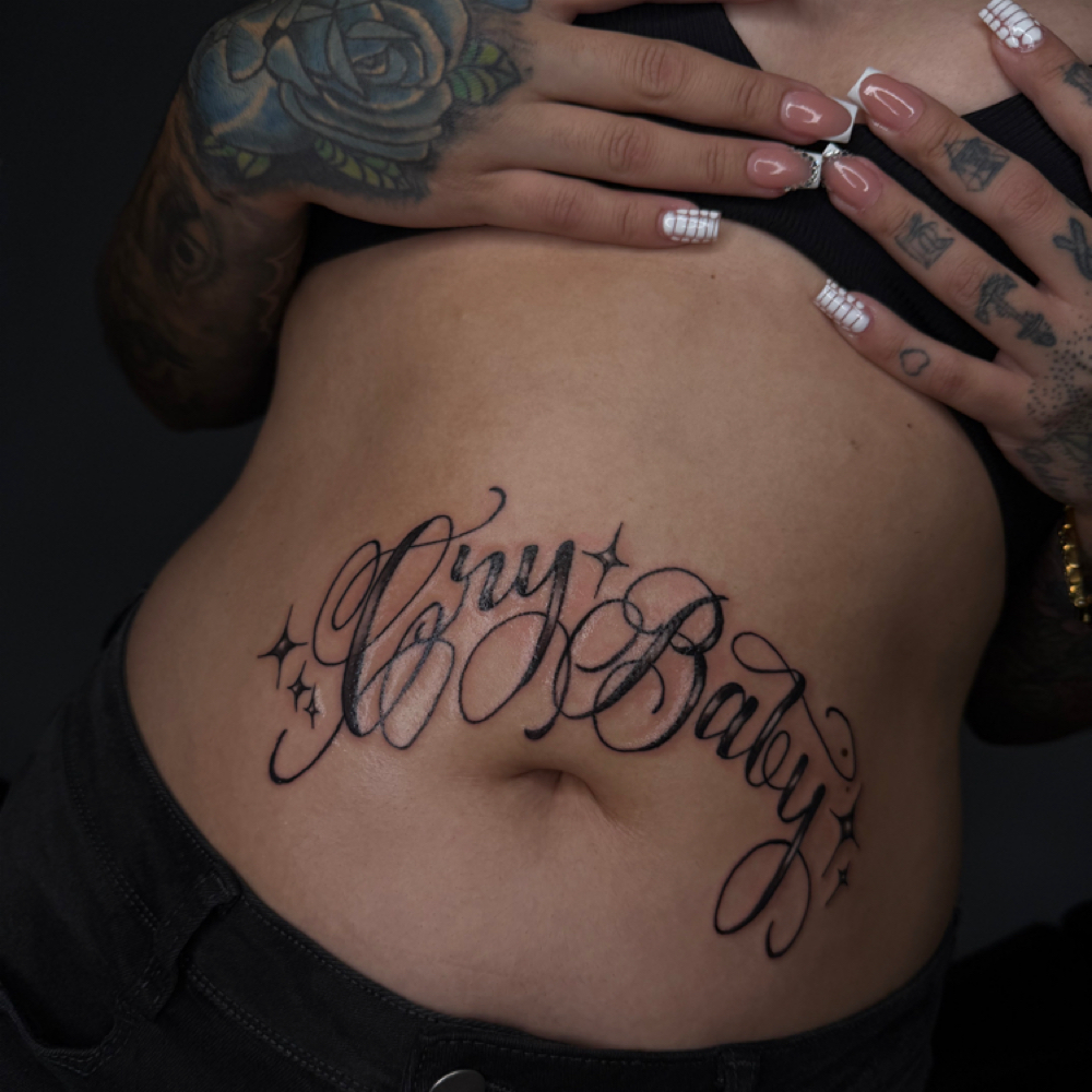Stomach tattoo at Rilla Tatted it in fayetteville, NC