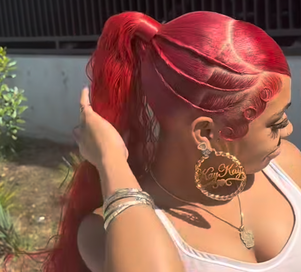 SIDE SWOOP & TWISTS PONYTAIL