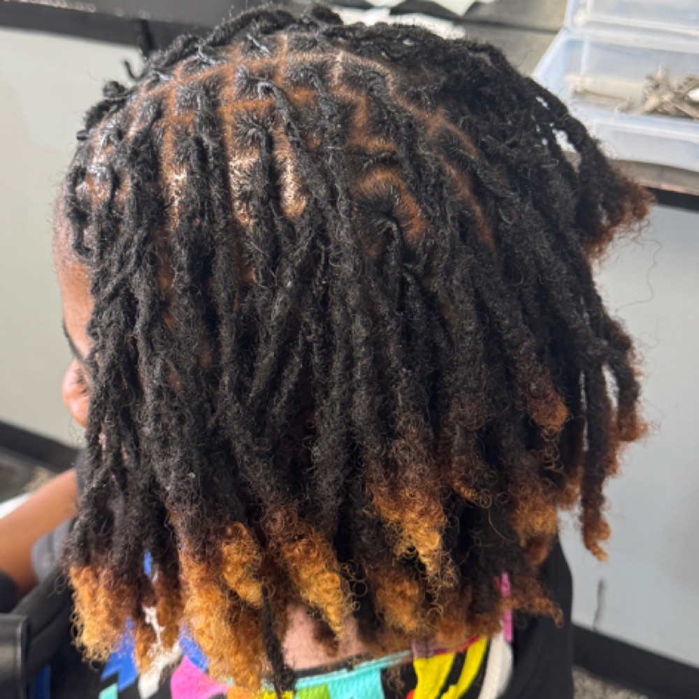 Loc retwist at Devine Artistry in Auburn, AL