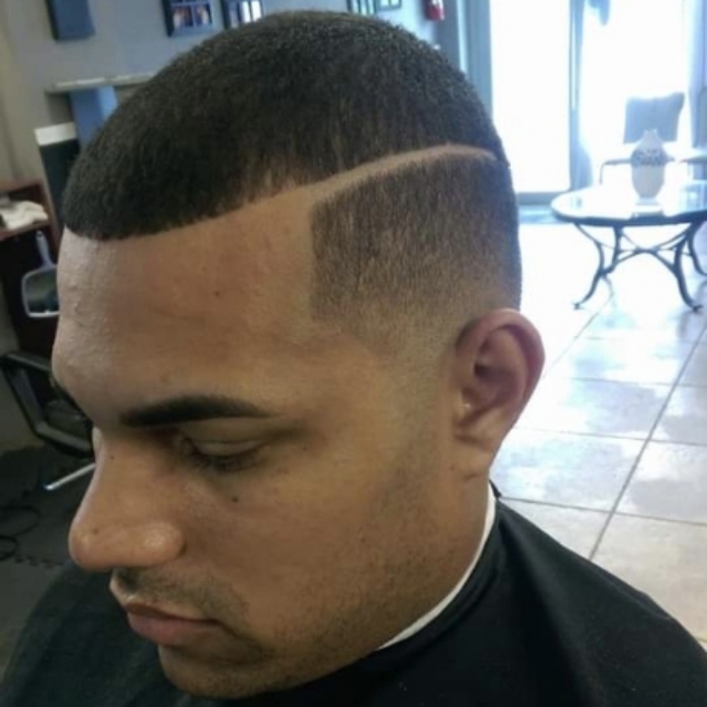 Fade/Taper/Mohawk/Buzz Haircut at Sammy's Hairstyle Studio in Cary, NC