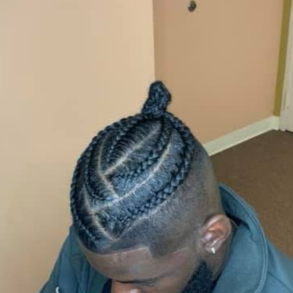 Man Braids at Neke Marché Beauty in Marietta, GA