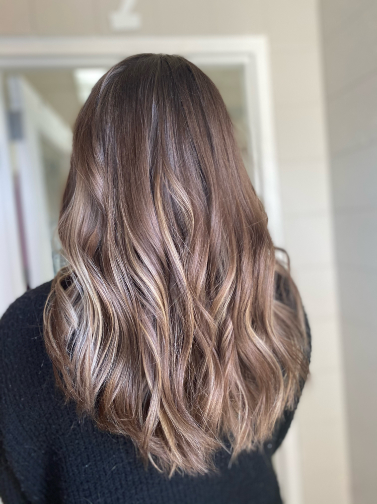 Woman's haircut and blow dry at Hair Creations By Kal in Idaho Falls, ID