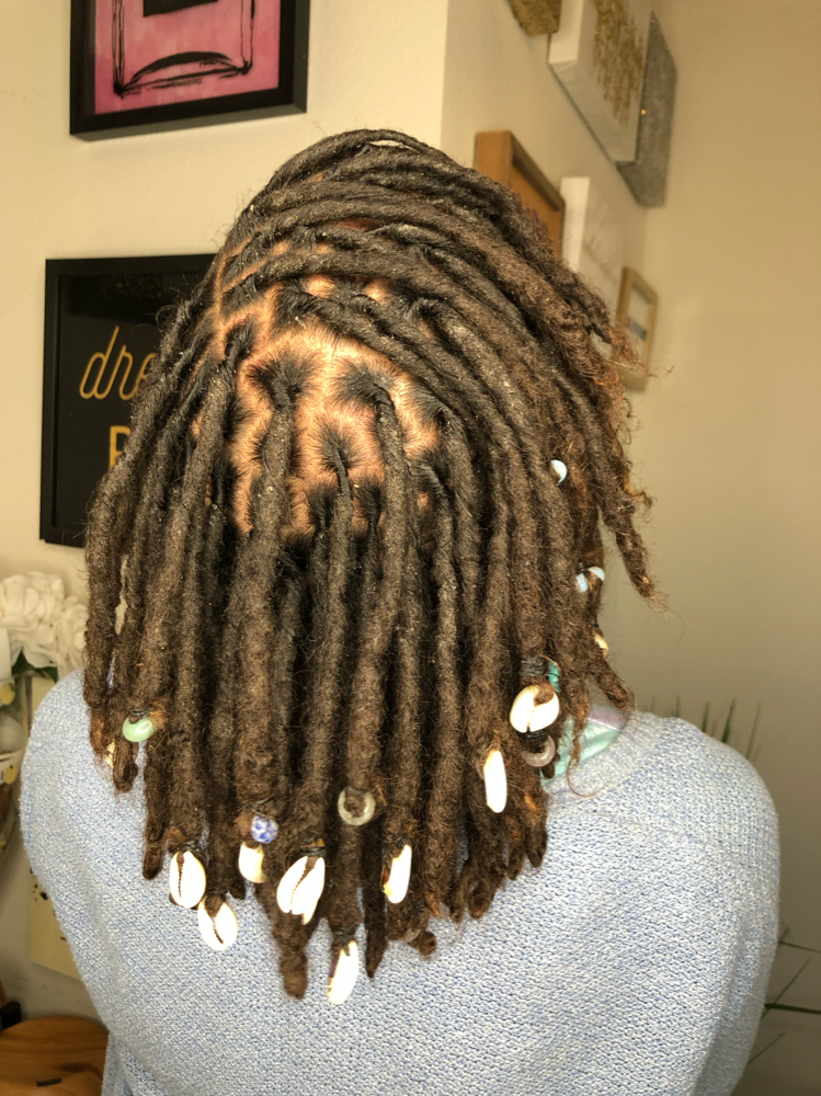 Medium length Locs re-twist