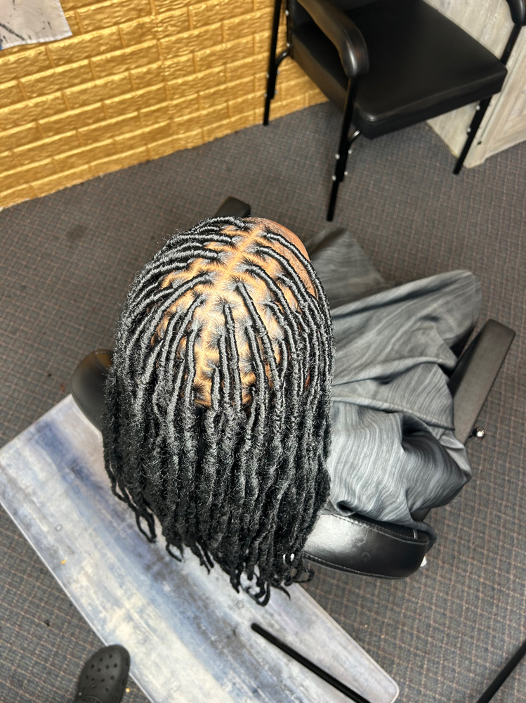 Soft faux locs on Natural Hair at Locs O’ Luv by Nola in Bloomington, IL