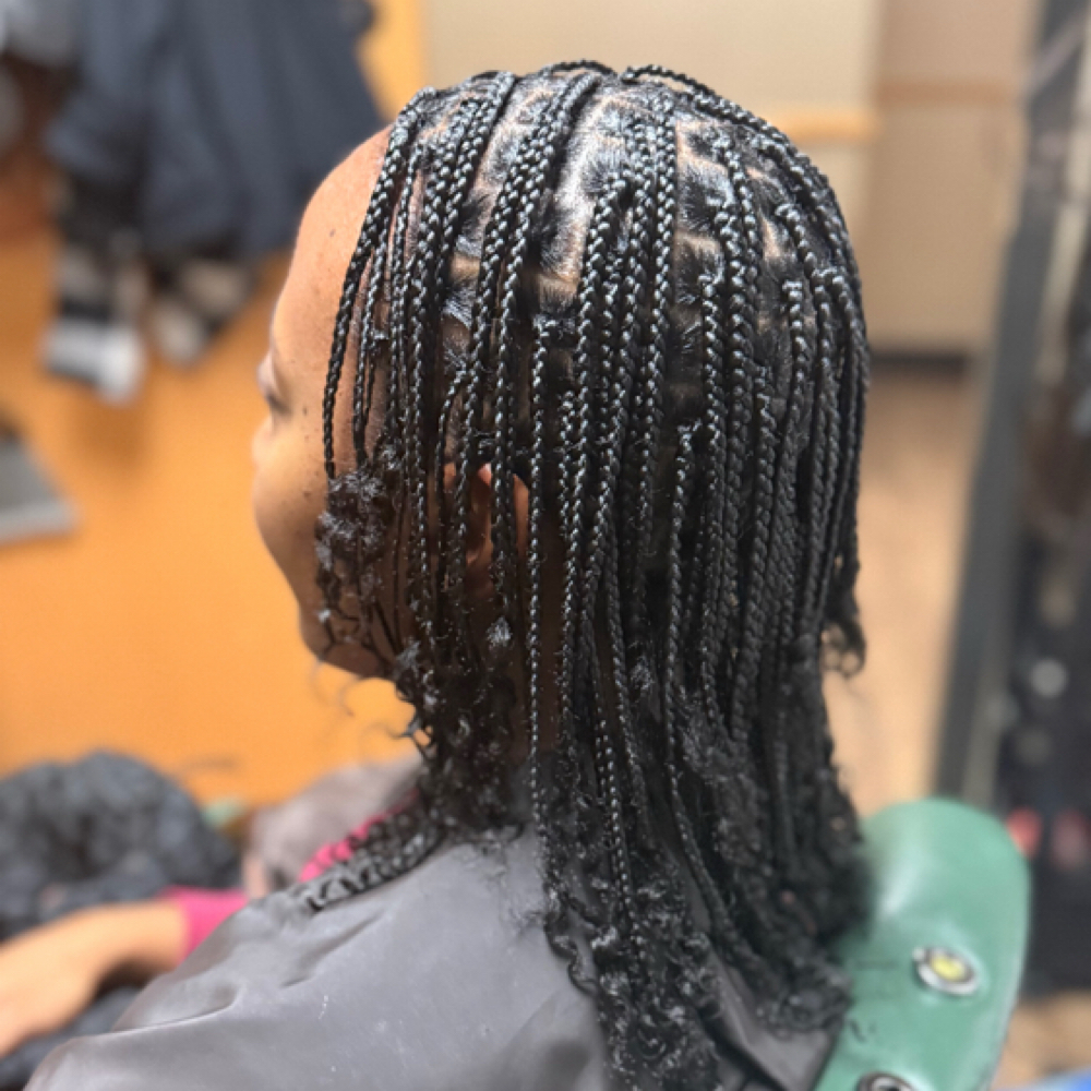 Singles Braids With Natural Hair at IAmHair Beauty Studio in Buffalo, NY